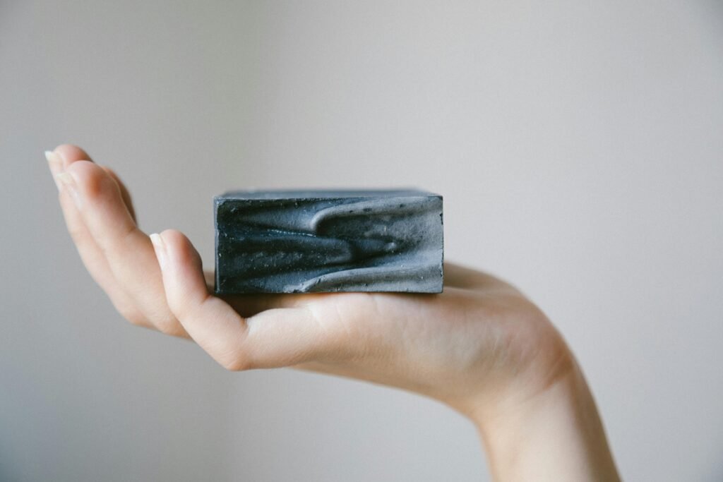 a person holding a soap